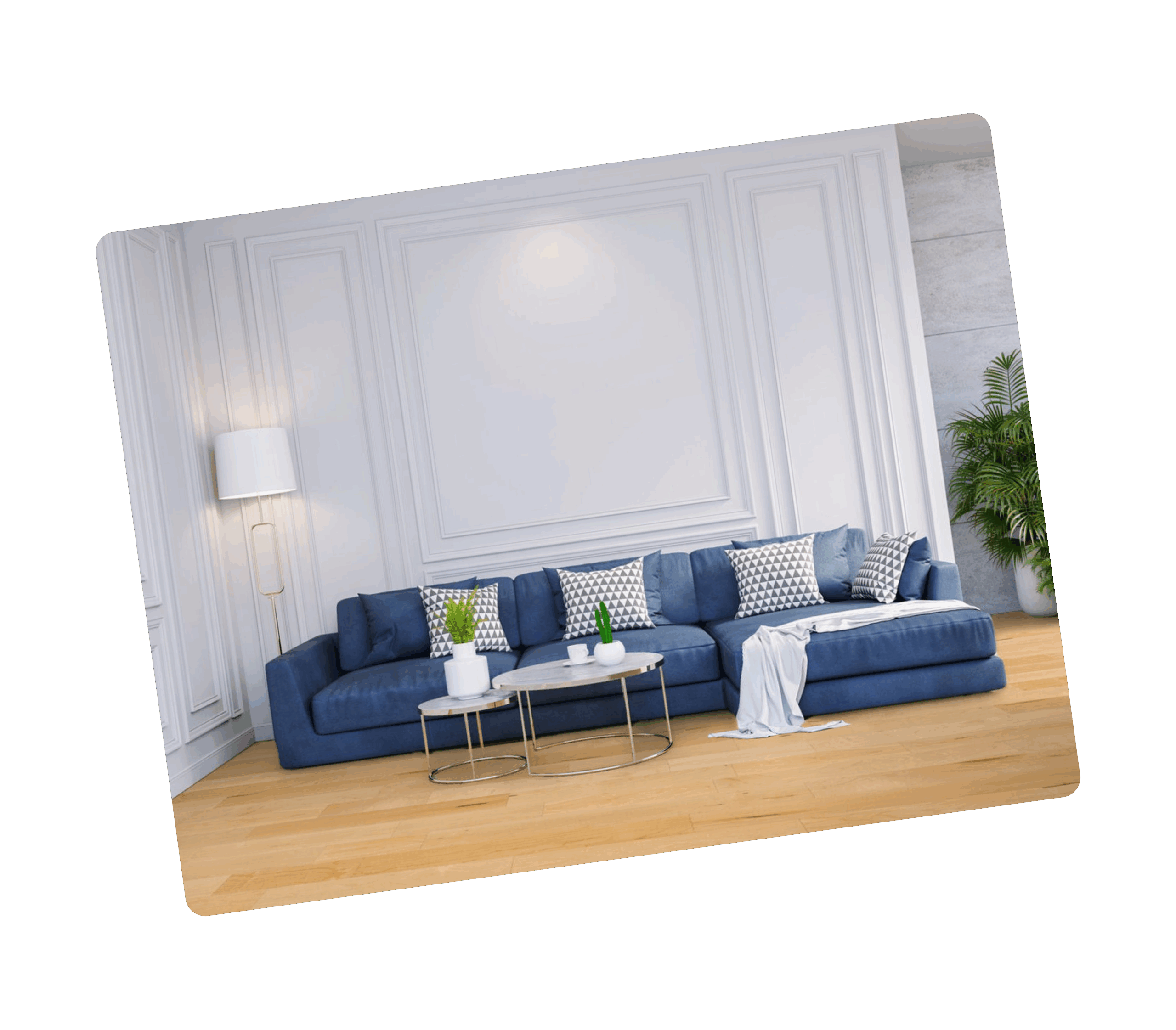 Bright living room with La Tuilerie engineered wood flooring, modern blue sofa and classic white wall mouldings