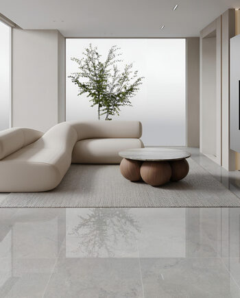 Pure Stone white tile with a natural stone effect in a minimalist living room with a fireplace